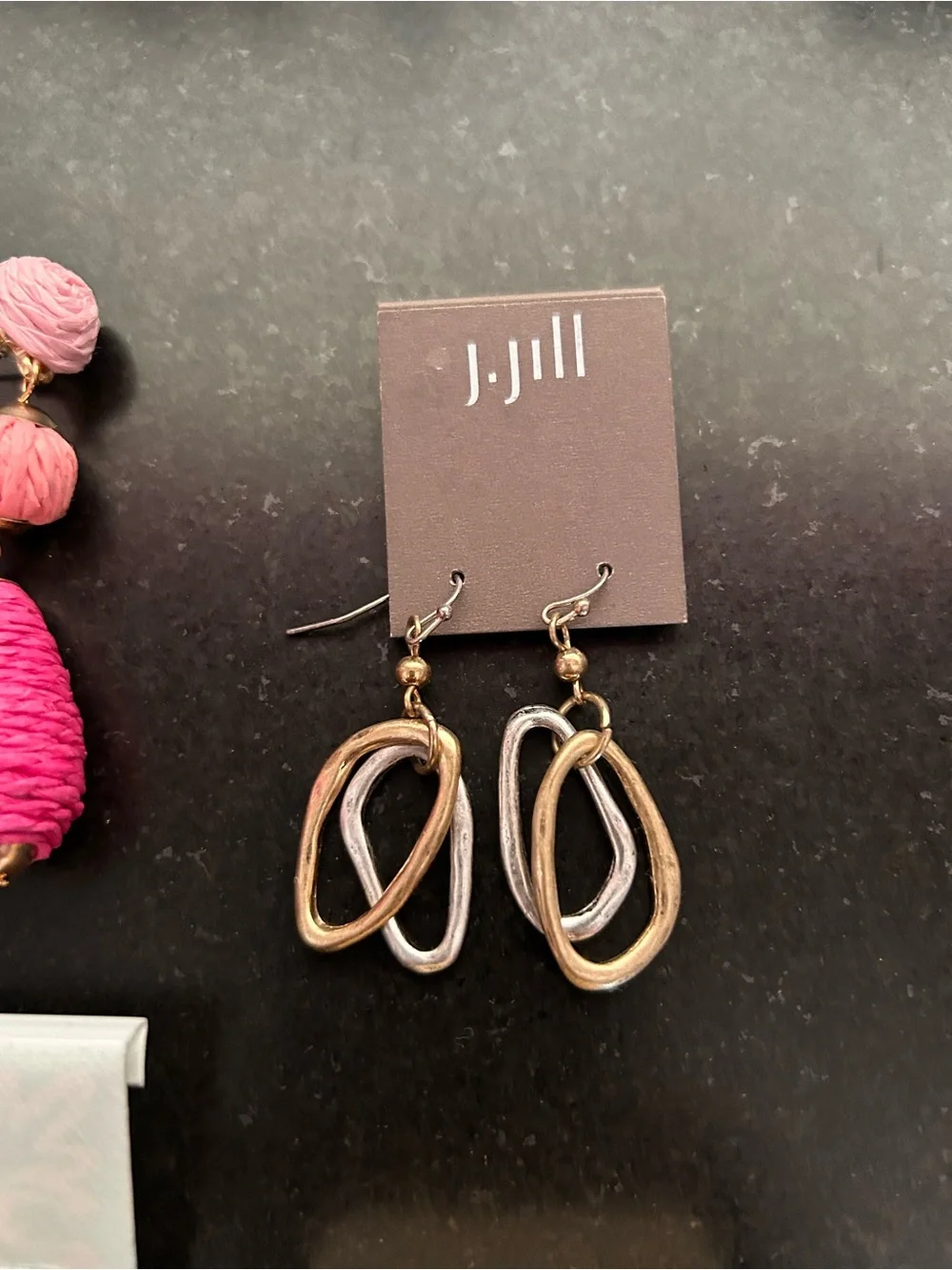 7 pair pierced earrings, drop style, most never worn, gold tone metals.